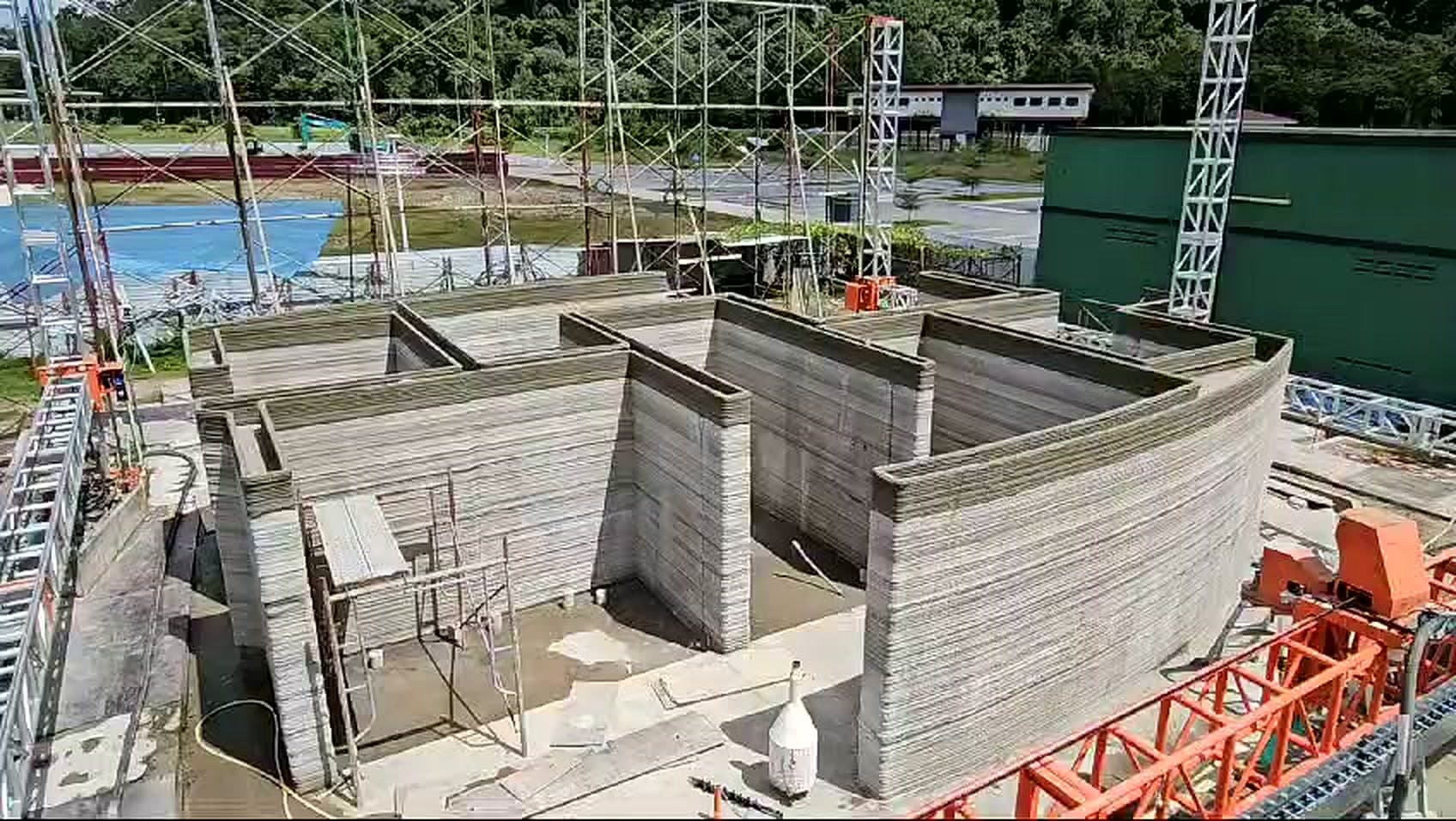 Aerial view of a 3D printed concrete wall system on site